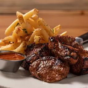 3/4 lb marinated steak tips with house-made steak sauce, broccoli, and French fries.