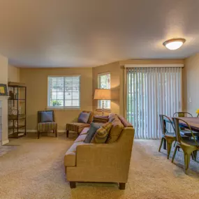 Living Area With Fireplace View at Commons at Avalon Park
