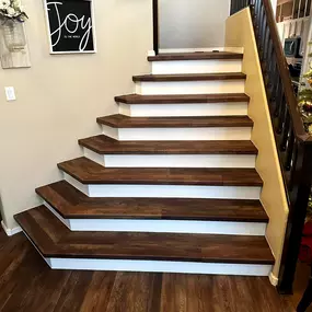 Enhance your home's staircase with custom flooring installation by Straight Edge Flooring. Our expert craftsmanship ensures every step looks stunning and lasts for years.