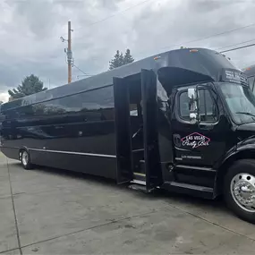 Las Vegas Party Bus 45 Passenger Party Bus with two dance poles, state of the art sound and lighting