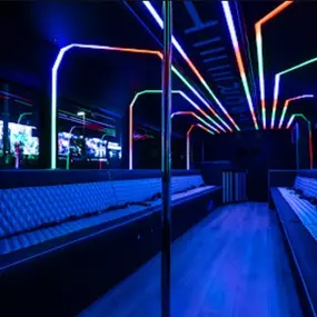 Las Vegas Party Bus 38 Passenger Let It Ride Interior with bar, dance pole and state of the art sound and lighting.