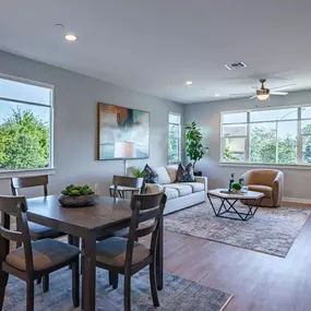 Living Room With Expansive Window and dining area