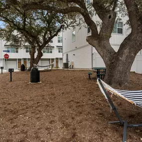 Courtyard with hammocks and benches