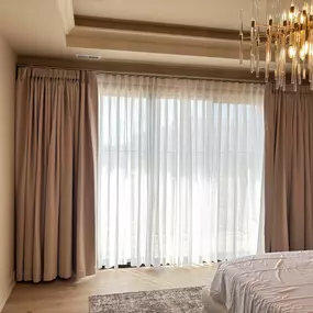 These stunning room darkening and sheer drapes have a duality of blocking the sun for total darkness during sleep, or letting warm sunlight come through during the day.  The home is located in suburban Indianapolis area, and has a great view of the greens and golf course.
