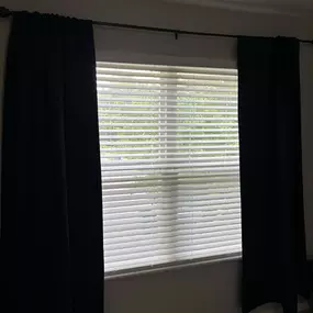 Faux wood blinds can be a great complement to drapes.