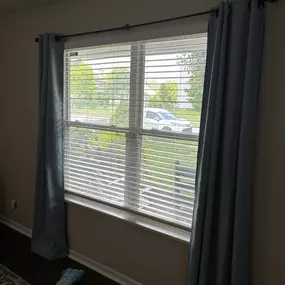 Faux wood blinds are an inexpensive way to provide privacy to street-side rooms in Indianapolis homes.