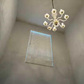 Some homes in Indianapolis have tall windows that bring in a lot of sun but can be difficult to control the light coming in.  Budget Blinds team put up a scaffolding to perfectly mount a faux wood blind where it mattered the most.