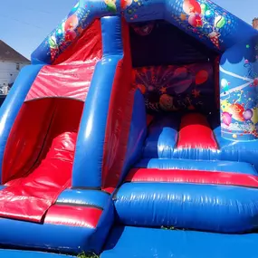 Red and Blue Party Themed Bouncy Castle with Slide for Hire
Make your child’s party unforgettable with our vibrant Red and Blue Party Themed Bouncy Castle with Built-In Slide! This Combi Castle is the perfect inflatable for both boys and girls, providing a safe and exciting space for them to bounce, jump, and slide. Whether you're planning a birthday party, christening, or a family fun day, this inflatable is sure to bring fun and laughter to your event.

Key Features:
Compact & Versatile Design