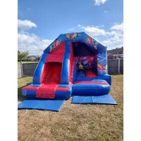 Red and Blue Party Themed Bouncy Castle with Slide for Hire
Make your child’s party unforgettable with our vibrant Red and Blue Party Themed Bouncy Castle with Built-In Slide! This Combi Castle is the perfect inflatable for both boys and girls, providing a safe and exciting space for them to bounce, jump, and slide. Whether you're planning a birthday party, christening, or a family fun day, this inflatable is sure to bring fun and laughter to your event.

Key Features:
Compact & Versatile Design