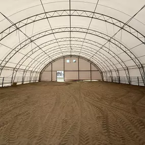 Pilot Buildings offers durable Britespan fabric structures, ideal for equestrian facilities. Benefit from spacious, column-free interiors for easy movement and storage, optimal ventilation for horse health, and weatherproof durability. Customizable sizes available.