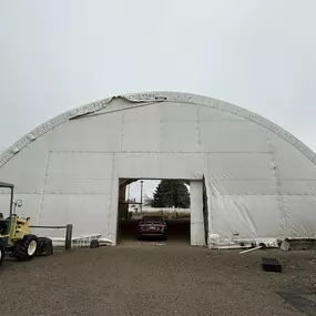 Pilot Buildings specializes in extending the life of fabric structures. This 27-year-old arena is set for a transformation with our durable, warrantied HDPE fabric re-covering service, making old buildings look and perform like new.