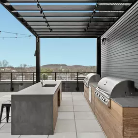 Grilling stations on a rooftop terrace