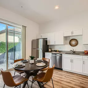 Fully Equipped Kitchen Includes Frost-Free Refrigerator, Electric Range, & Dishwasher