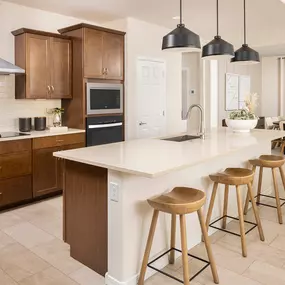 El Rancho Santa Rosa has a beautiful kitchen island in their new construction home in Maricopa, AZ.