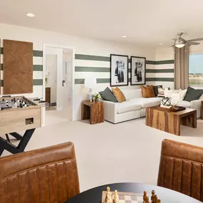 Spacious modern game room in El Rancho Santa Rosa in Maricopa, AZ, by Pulte home builders.