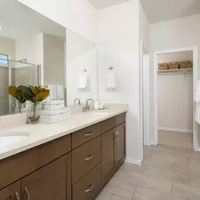 Double vanity bathroom in this new construction in El Rancho Santa Rosa in Maricopa, AZ, by Pulte.