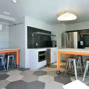 Gourmet community kitchen with epicurean tables