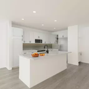 Bright white kitchen with island at Camden Blakeney in Charlotte, NC