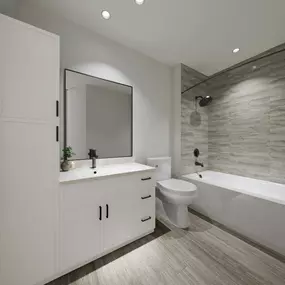 Bright white apartment bathroom at Camden Blakeney in Charlotte, NC