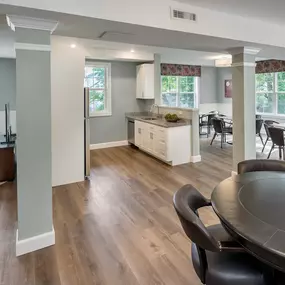 Living room with kitchen and dining tables