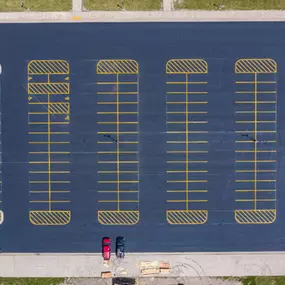 aerial view of a new completed parking lot striping project