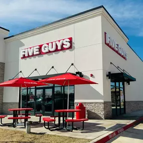 Exterior photograph of the Five Guys restaurant at 8633 Davis Boulevard in North Richland Hills, Texas.