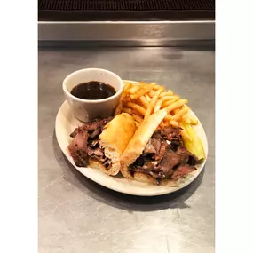 Craving comfort food? Our French Dip sandwich is calling your name!  Tender roast beef, melted cheese, and our signature au jus for dipping. Served with crispy golden fries or a side of your choice. Perfect for lunch or dinner! Order now: https://flancers.com #FlancersSandwiches #ComfortFood