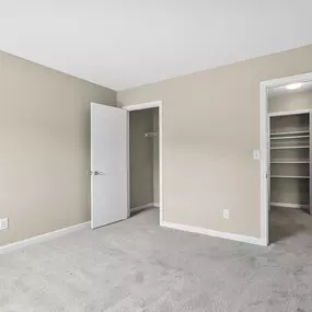 Empty bedroom with closet