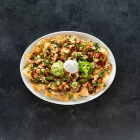 Enjoy a variety of appetizers, like our Chicken Nachos, while watching your favorite sports games.