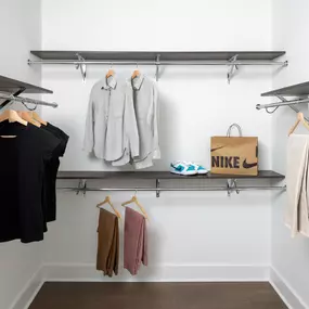 Spacious walk-in closet with custom shelving and ample storage.