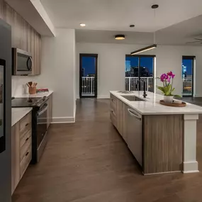 Modern kitchen with city views and sleek finishes.