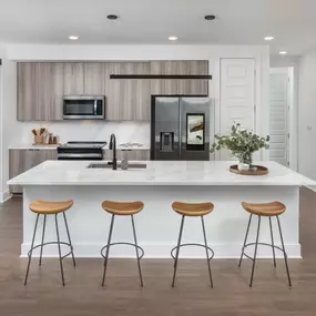 Sleek kitchen with a spacious island and modern finishes.