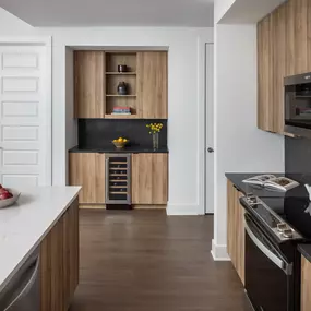 Kitchen nook with built-in wine storage and sleek finishes.