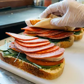 Italian Sandwich
The Italian sandwich features fresh sourdough bread, baked daily in-house, layered with mozzarella, salami, and pepperoni. It’s a hearty, flavorful option for lunch, crafted with the best ingredients and love.