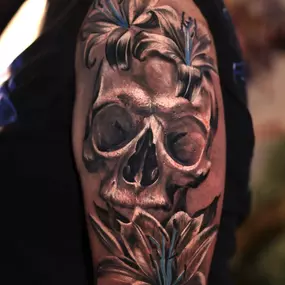 Black and gray skull and flowers by Brandon Sontag Tattoos & Fine Art in Columbus, Ohio