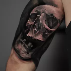 Custom tattoo, black and gray skull by Brandon Sontag at RedTree Tattoo Gallery in Columbus, Ohio