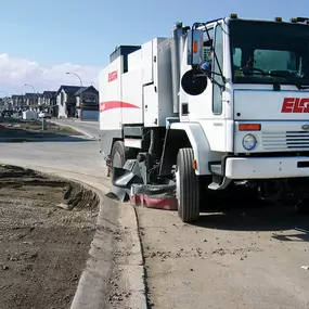 Professional street sweeping services in Dallas-Fort Worth provided by C & D Commercial Services, using heavy-duty sweeper trucks to clean streets, parking lots, and construction sites. Services include debris removal, curb line cleaning, and maintenance programs for cities, private roadways, and construction areas.