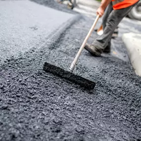 Asphalt repair services in Dallas-Fort Worth area, showcasing professional pothole repair, resurfacing, and sealcoating to enhance parking lots and roadways.