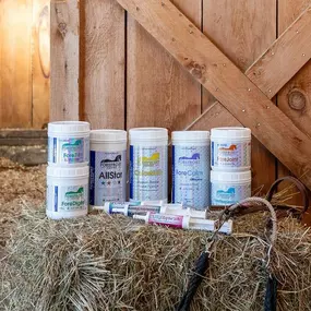 ForeFront Equine Supplements on a bale of hay