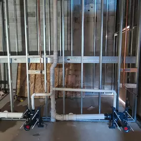 Commercial rough-in for wall-hung toilets