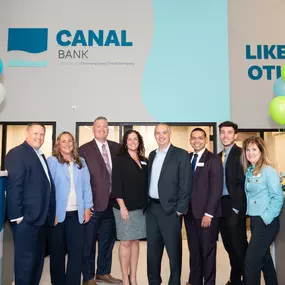 Canal Bank team celebrating grand opening event.