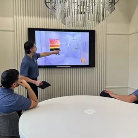 At Ledezma Remodeling, collaboration, and planning are key to bringing your vision to life. Here, our team reviews design concepts for a custom bathroom renovation. Visit our website to see how we can make your home remodeling ideas a reality.