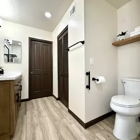 Experience a stylish and functional bathroom remodel with Ledezma Remodeling. This beautifully renovated space features warm wood tones, sleek black fixtures, and a modern vanity for a sophisticated touch. Whether you're planning a full home renovation or a bathroom remodeling project, Ledezma Remodeling delivers expert craftsmanship to bring your vision to life.