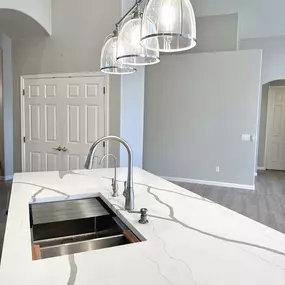 Here’s another stunning project by Ledezma Remodeling, featuring a beautifully installed kitchen island countertop with a sleek, modern design. Give us a call or visit our website to ask for a free estimate to experience quality home and bathroom remodeling service.