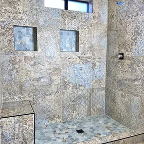 Transform your daily routine with this breathtaking bathroom remodeling project by Ledezma Remodeling. From the elegant blend of textured tiles to the eye-catching hexagonal accents, every detail is designed for both beauty and comfort. Whether you're looking for a complete shower renovation or a full bathroom makeover, Ledezma Remodeling brings craftsmanship and style together to create a space you'll love for years to come!