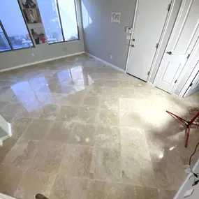 Ledezma Remodeling transformed this space with beautiful polished travertine flooring, adding timeless elegance and natural warmth. As part of a larger home remodeling or whole home remodeling project, this flooring upgrade enhances both style and value. Every tile is expertly installed to create a cohesive, high-end look.