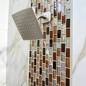 Ledezma Remodeling brings creativity and care to every project as a leading bathroom remodeling contractor. This bold tile layout makes the shower wall the star of the room, creating a look that’s stylish, refreshing, and totally unique to your space.