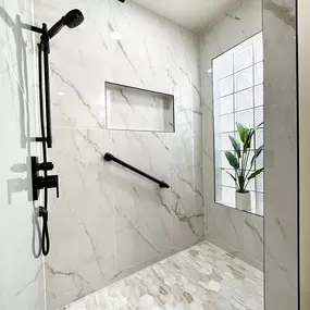 Ledezma Remodeling transformed this shower into a serene escape with clean lines, textured tile, and a design that balances beauty and accessibility. This bathroom renovation proves that practicality and elegance can absolutely go hand in hand.