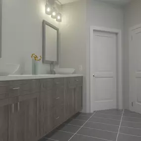 This elegant bathroom design by Ledezma Remodeling showcases a modern yet warm bathroom renovation featuring a spacious walk-in shower with mosaic tile accents and a built-in bench for added comfort. The dual-sink vanity with natural wood cabinetry complements the earthy tones throughout the space, while large windows bring in natural light and connect the room to its serene surroundings. It's a perfect example of thoughtful bathroom remodeling and shower renovation that blends luxury and functi
