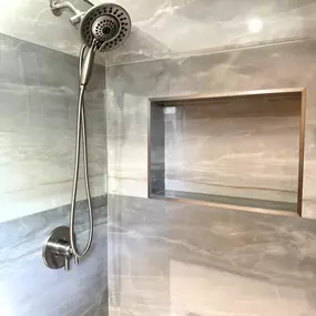 This shower renovation by Ledezma Remodeling is a masterclass in modern serenity. Clean lines, calming hues, and a seamless tile finish come together to create a bathroom sanctuary that’s both functional and effortlessly beautiful. Every inch reflects thoughtful design tailored for daily comfort.